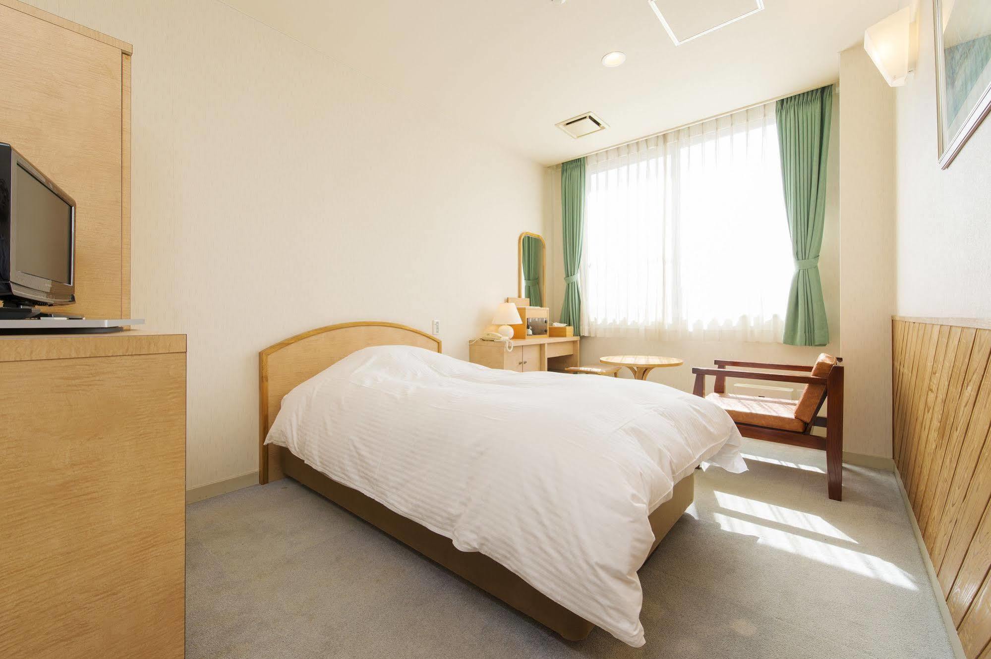 Hotel Takachiho Buitenkant foto